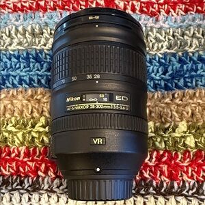 Nikon Nikkor Lens in Gold Box